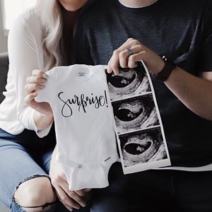 Newborn pregnancy announcement onesie